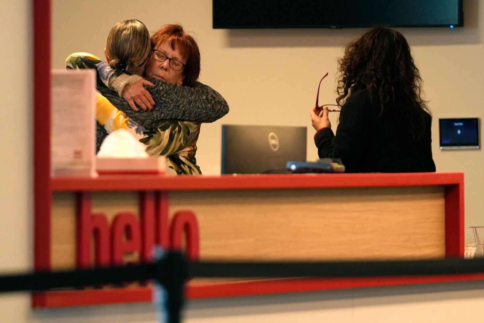 Women embrace in the reception area at The Skating Club of Boston on Thursday, January 30. Several members of the figure skating community were aboard the jet that collided with a US Army helicopter near Washington, DC, on Wednesday. The Skating Club of Boston <a href="index.php?page=&url=https%3A%2F%2Fwww.cnn.com%2Fus%2Flive-news%2Fplane-crash-dca-potomac-washington-dc-01-29-25%23cm6jgs31h0000356muf7ke5dv">named six victims</a>, including Evgenia Shishkova and Vadim Naumov, the 1994 world champions in pairs.