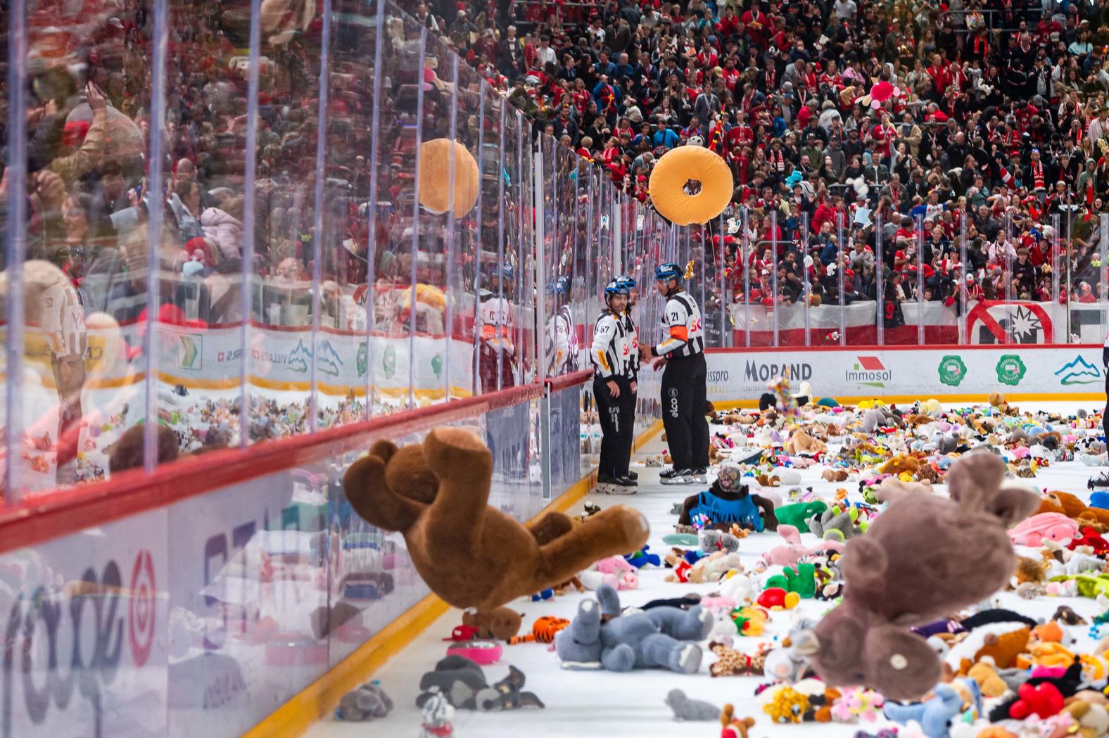 Fans throw stuffed animals on the ice during a Swiss National League hockey game between Lausanne HC and SC Bern Lausanne, Switzerland, on Sunday, September 28.