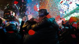 Joey and Claudia Flores, of California, kiss as confetti falls during a celebration of the new year in New York's Times Square, Tuesday, Jan. 1, 2019. (AP Photo/Adam Hunger)