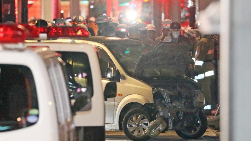 Police inspect a car whose driver rammed his vehicle into crowds on Takeshita street in Tokyo early January 1, 2019. - Nine people were hurt, one seriously, when a man deliberately ploughed his car into crowds celebrating New Year's Eve along a famous Tokyo street, police and media said on January 1. (Photo by JIJI PRESS / JIJI PRESS / AFP) / Japan OUT        (Photo credit should read JIJI PRESS/AFP/Getty Images)