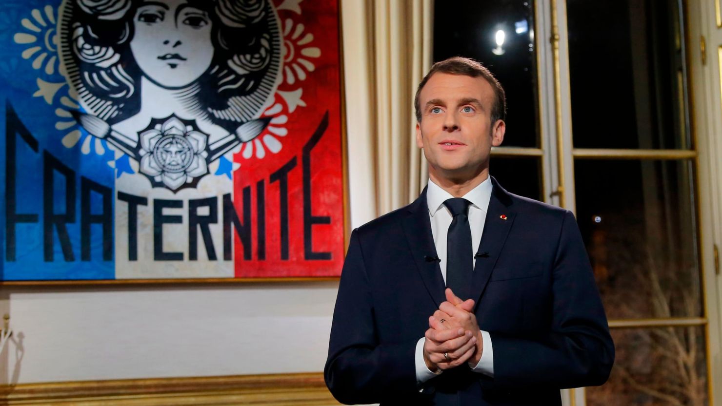 French President Emmanuel Macron delivers his New Year wishes during a televised address to the nation from the Elysee Palace in Paris on December 31, 2018. 