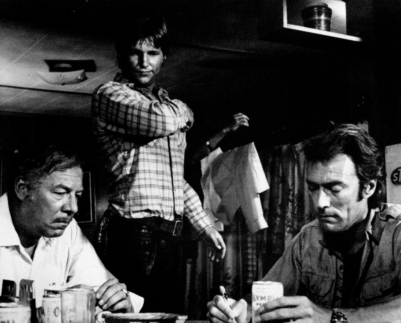 Bridges, center, looks over George Kennedy, left, and Clint Eastwood during the 1974 film "Thunderbolt and Lightfoot." Bridges' performance in the movie earned him another Oscar nomination.