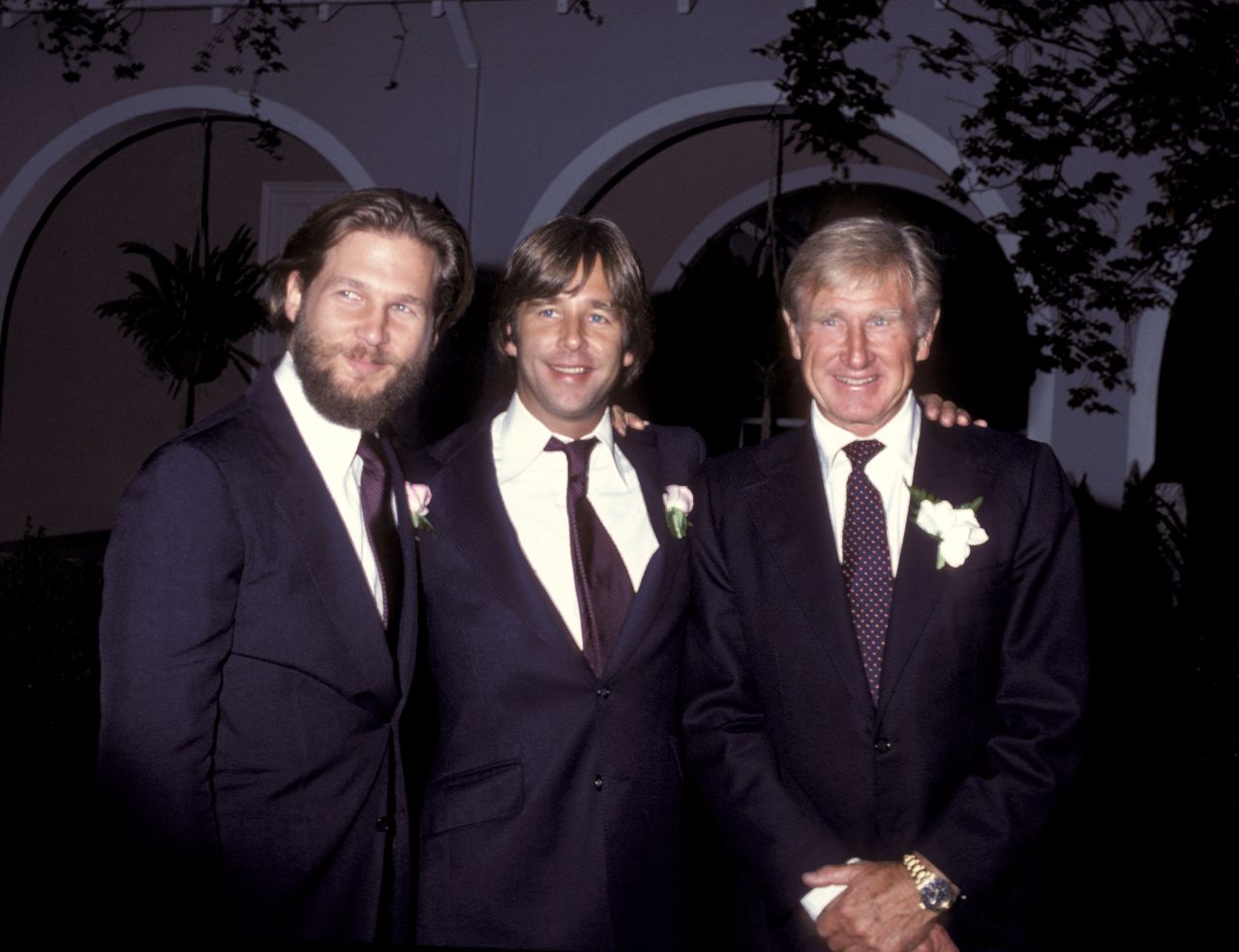 Bridges, left, takes a photo with his brother and his father during his sister Cindy's wedding in 1979.