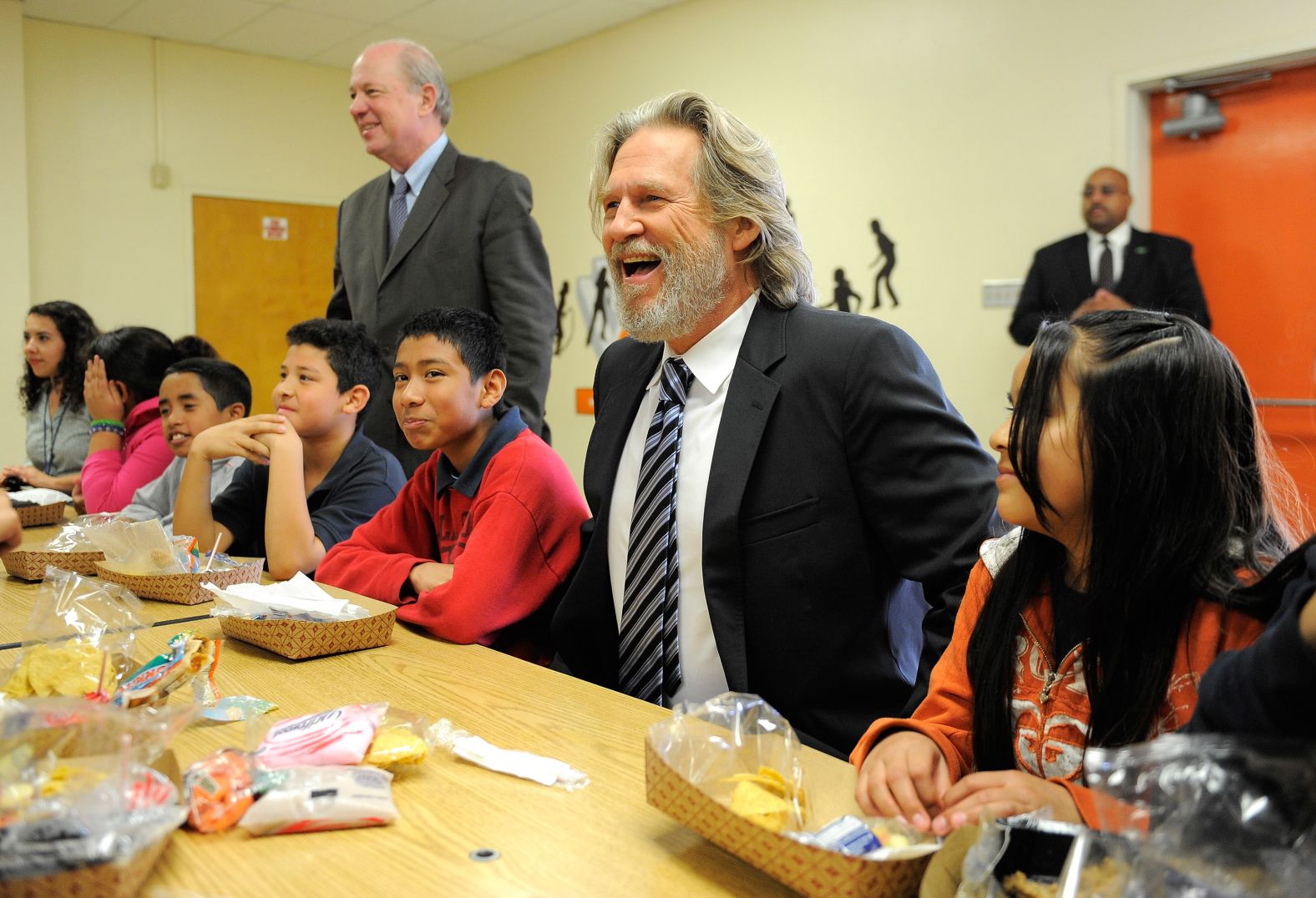 Bridges poses with elementary school students in Los Angeles at the launch of the "No Kid Hungry" campaign in 2011. In 1983, Bridges founded the End Hunger Network, a nonprofit organization dedicated to feeding children around the world.