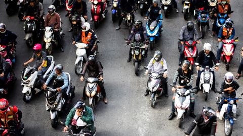Motorists wait at a traffic light in Bangkok on November 29, 2018. 