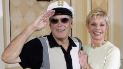 "Captain" Daryl Dragon and his wife Toni Tennille of the music duo The Captain and Tennille, pose at the Video Software Dealers Association's annual home video convention at the Bellagio July 27, 2005 in Las Vegas, Nevada. They are promoting a Christmas album entitled "Saving Up Christmas" and a DVD box set that will each be released October 11, 2005.