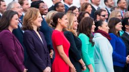 UNITED STATES - NOVEMBER 14: Members-elect including Alexandria Ocasio-Cortez, D-N.Y., in red, pose for the freshman class photo on the East Front of the Capitol on November 14, 2018. (Photo By Tom Williams/CQ Roll Call)