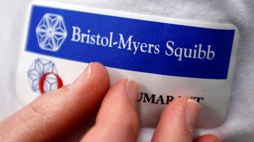 Logo of global biopharmaceutical company Bristol-Myers Squibb is pictured on the blouse of an employee in Le Passage, near Agen, France March 29, 2018. REUTERS/Regis Duvignau