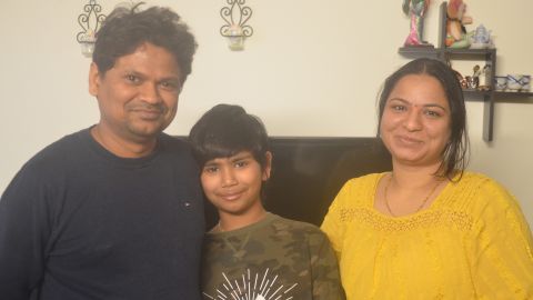 Fifth-grader Advaik Nandikotkur with his proud father and mother after saving the man from drowning.