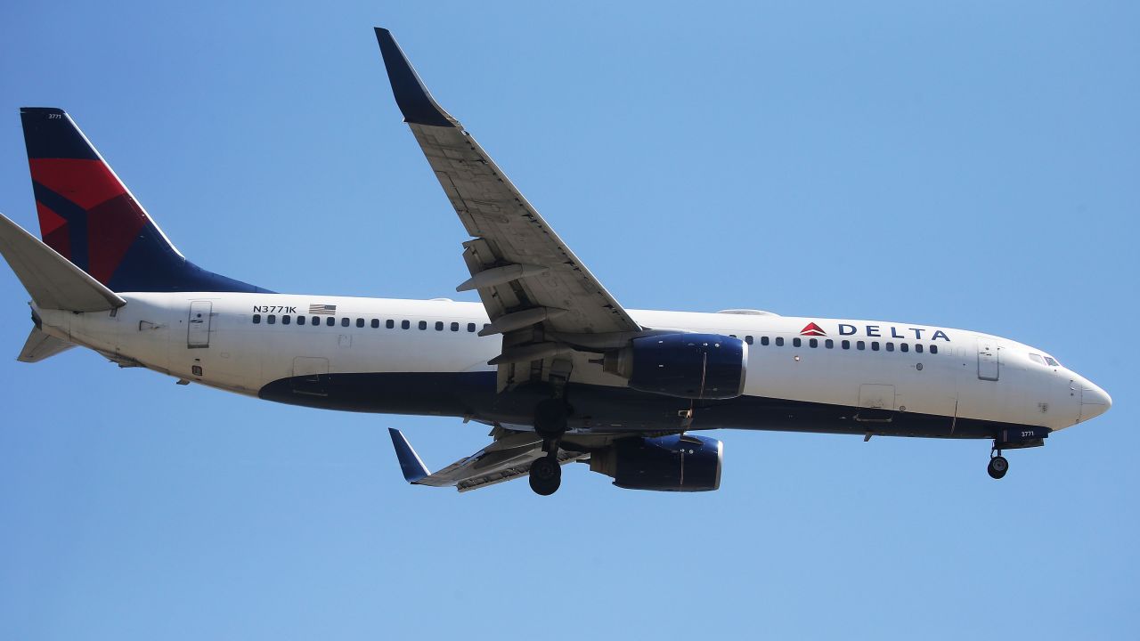 LOS ANGELES, CA - JULY 12:  A Delta Air Lines plane lands at Los Angeles International Airport on July 12, 2018 in Los Angeles, California. Delta announced today that it will increase fares by reducing the supply of seats in an effort to offset higher fuel prices.  (Photo by Mario Tama/Getty Images)