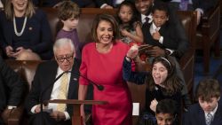 With some enthusiastic assistance from her grandchildren, House Democratic Leader Nancy Pelosi of California smiles as she casts her vote for herself to be speaker of the House on the first day of the 116th Congress, at the Capitol in Washington, Thursday, Jan. 3, 2019. (AP/J. Scott Applewhite)