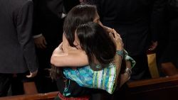 Rep. Deb Haaland (D-NM) and Sharice Davids (D-KS) embrace on the House floor 01/03.