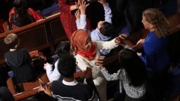 WASHINGTON, DC - JANUARY 03: Newly elected Rep. Ilhan Omar (D-MN) celebrates with her children after taking her oath of office during the first session of the 116th Congress at the U.S. Capitol January 03, 2019 in Washington, DC. Under the cloud of a partial federal government shutdown, Speaker of the House Nancy Pelosi reclaimed her former title as Speaker and her fellow Democrats will take control of the House of Representatives for the second time in eight years. (Photo by Win McNamee/Getty Images)