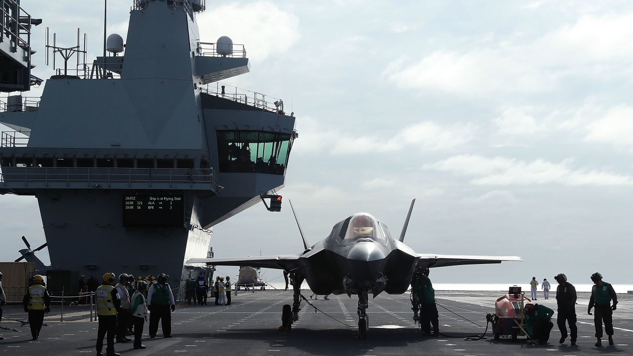 A new F-35B Lightning fighter jet is prepped for take off from the deck of the United Kingdom's new aircraft carrier, HMS Queen Elizabeth at sea in September 2018.