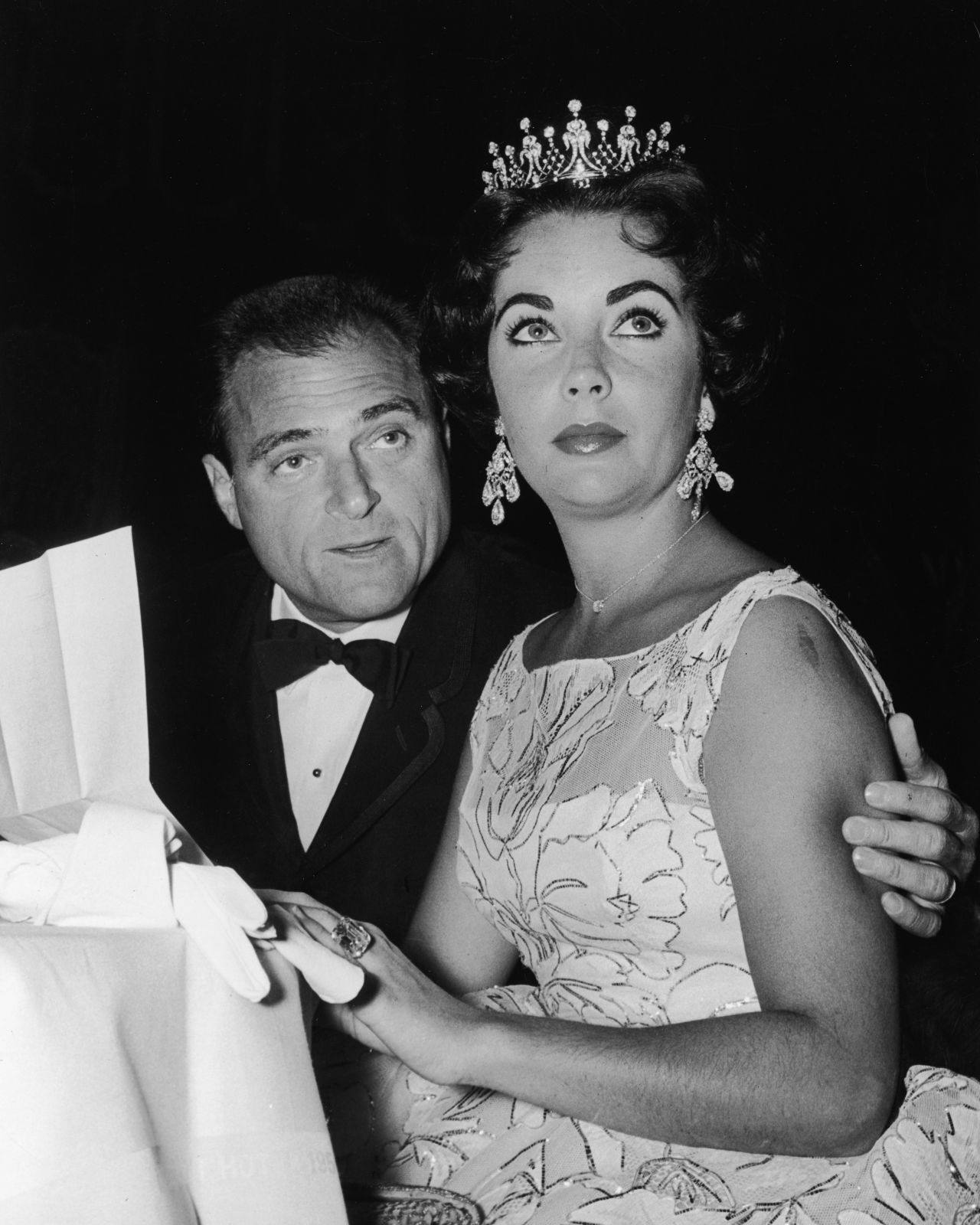 Q for Queen: Elizabeth Taylor opted for regal glamor in 1957, when she turned up in a sparkling tiara.