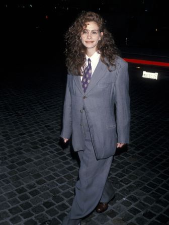 S for Suits: Julia Roberts showed that suits are for everyone when she wore an oversized two-piece in 1990, and a slightly better-fitting one the year after. 