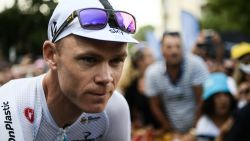 Great Britain's Christopher Froome cycles past spectators during the signing in ceremony prior to the 15th stage of the 105th edition of the Tour de France cycling race, between Millau and Carcassonne on July 22, 2018. (Photo by Philippe LOPEZ / AFP)        (Photo credit should read PHILIPPE LOPEZ/AFP/Getty Images)