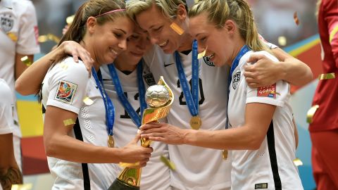 Wambach (center) with teammates after winning the World Cup in 2015. 