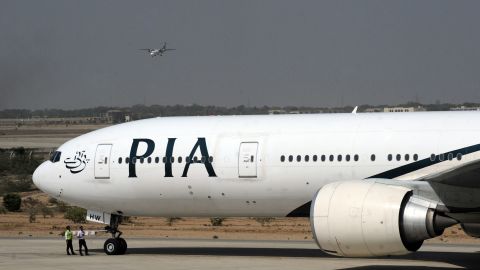 A London-bound state-run Pakistan International Airlines (PIA) plane taxies before take-off from Karachi International Airport in Karachi on April 21, 2010. PIA began making plans for around 18,000 passengers, about half stuck in Pakistan and half overseas trying to get home. Thousands of frustrated passengers have begun flying out of Asia's airports for Europe, almost a week after volcanic ash closed European skies. AFP PHOTO/ Asif HASSAN (Photo credit should read ASIF HASSAN/AFP/Getty Images)