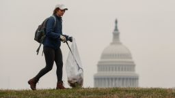 Volunteers, many of whom are furloughed workers, clean up trash on the National Mall in response to the partial government shutdown in Washington, U.S., January 4, 2019. 