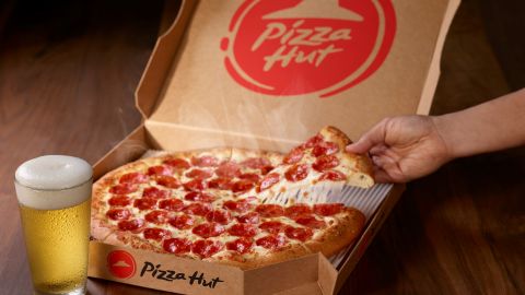 Pizza Hut hopes to expand beer delivery to 1,000 locations by the summer. 