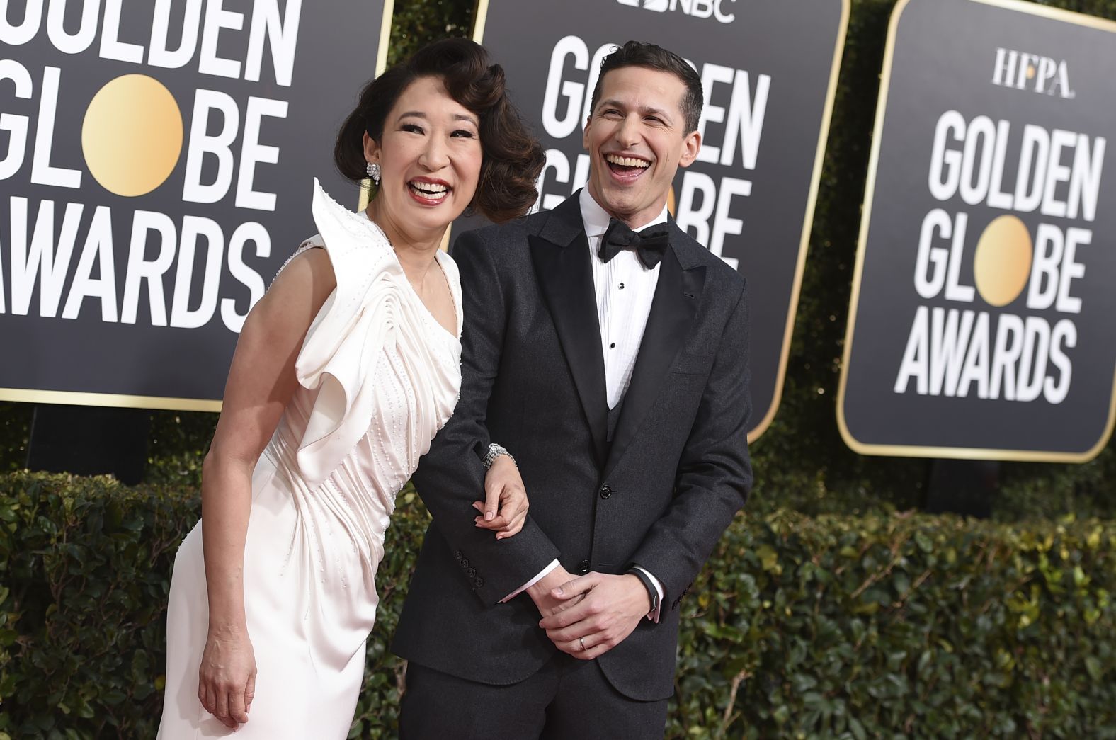 Show hosts Sandra Oh and Andy Samberg