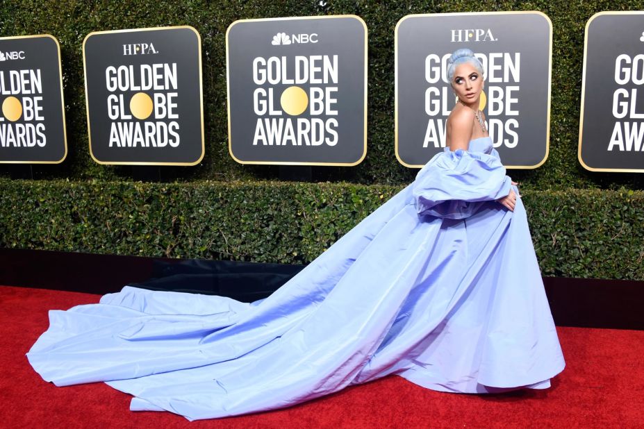 Lady Gaga's fairytale Valentino dress seemed to pay homage to one worn by Judy Garland in the 1954 version of "A Star is Born." She accessorized with a breathtaking Tiffany's diamond necklace. 