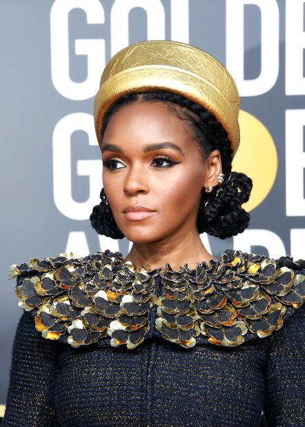 Janelle Monae wore an elaborate golden collar and pillbox hat from Chanel's recent Egypt-inspired Metiers d'Art collection.