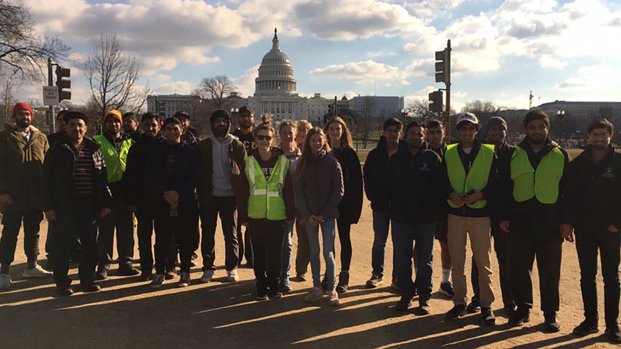 Muslim youth group members help clean up national parks during the government shutdown. 
