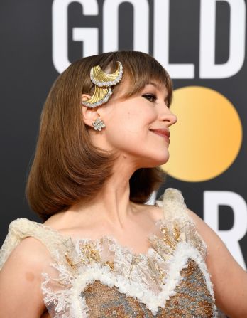 Musician Joanna Newsom, who attended with awards' co-host and husband Andy Samberg, accessorized her Rodarte oufit with a striking hair clip and earrings.