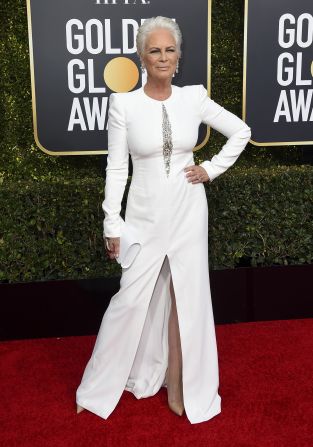 Jamie Lee Curtis was a vision in white -- from head to toe. She wore a sleek long-sleeved gown with silver embellishments by Alexander McQueen.