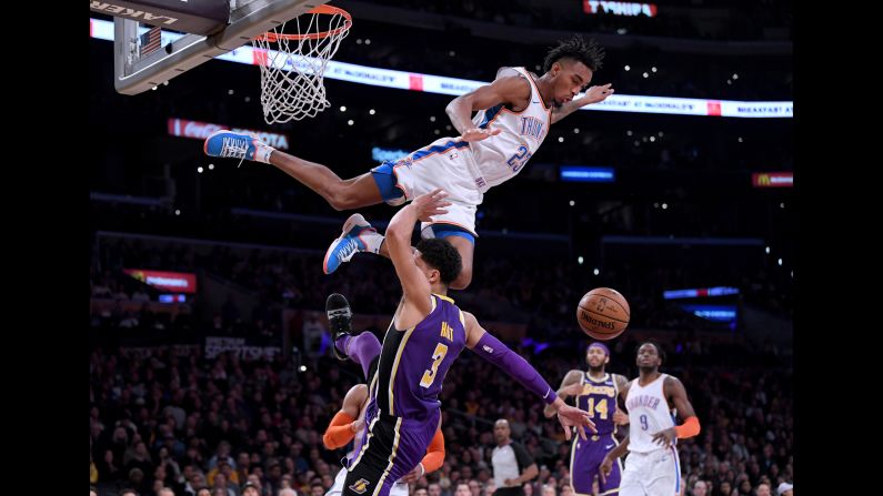 Oklahoma City's Terrance Ferguson goes flying over the Lakers' Josh Hart during an NBA game in Los Angeles on Wednesday, January 2. Ferguson was called for a foul on the play.