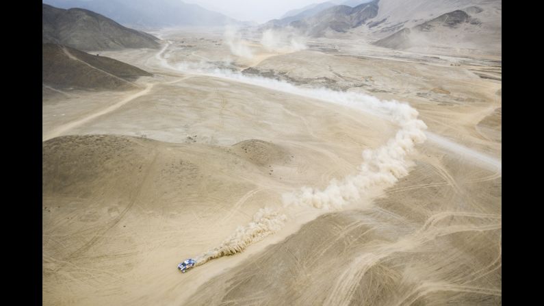 Carlos Sainz test-drives his vehicle in Lima, Peru, as he prepares for the Dakar Rally on Friday, January 4.