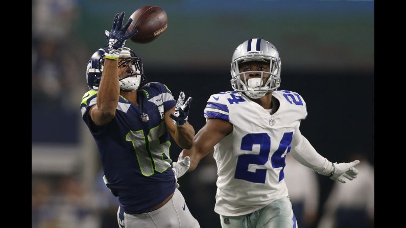 Seattle wide receiver Tyler Lockett catches a pass during the playoff game against Dallas on Saturday, January 5.