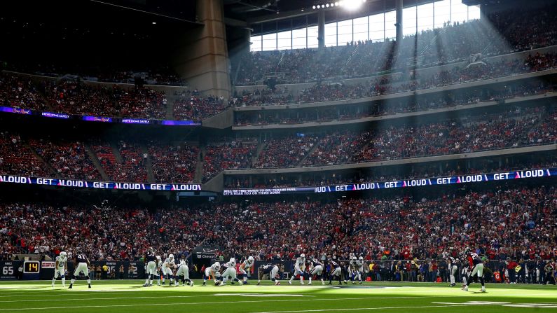Indianapolis quarterback Andrew Luck takes a snap during an NFL playoff game in Houston on Saturday, January 5. Luck and the Colts defeated Houston 21-7.