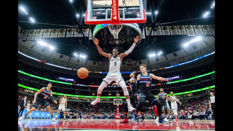 Brooklyn's DeMarre Carroll, center, reacts to a loose ball during an NBA game in Chicago on Sunday, January 6.