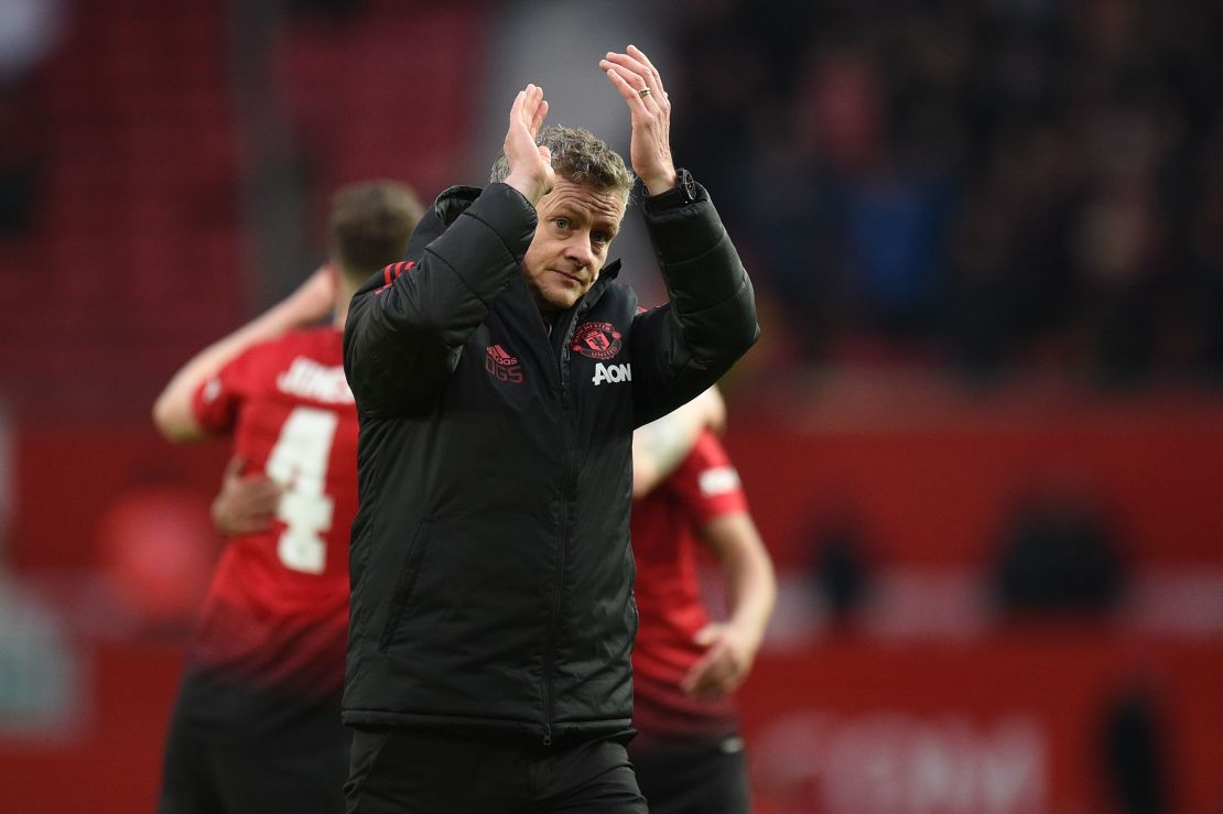 Manchester United's Norwegian caretaker manager Ole Gunnar Solskjaer gestures to the crowd at the end of his team's match against Reading at Old Trafford.