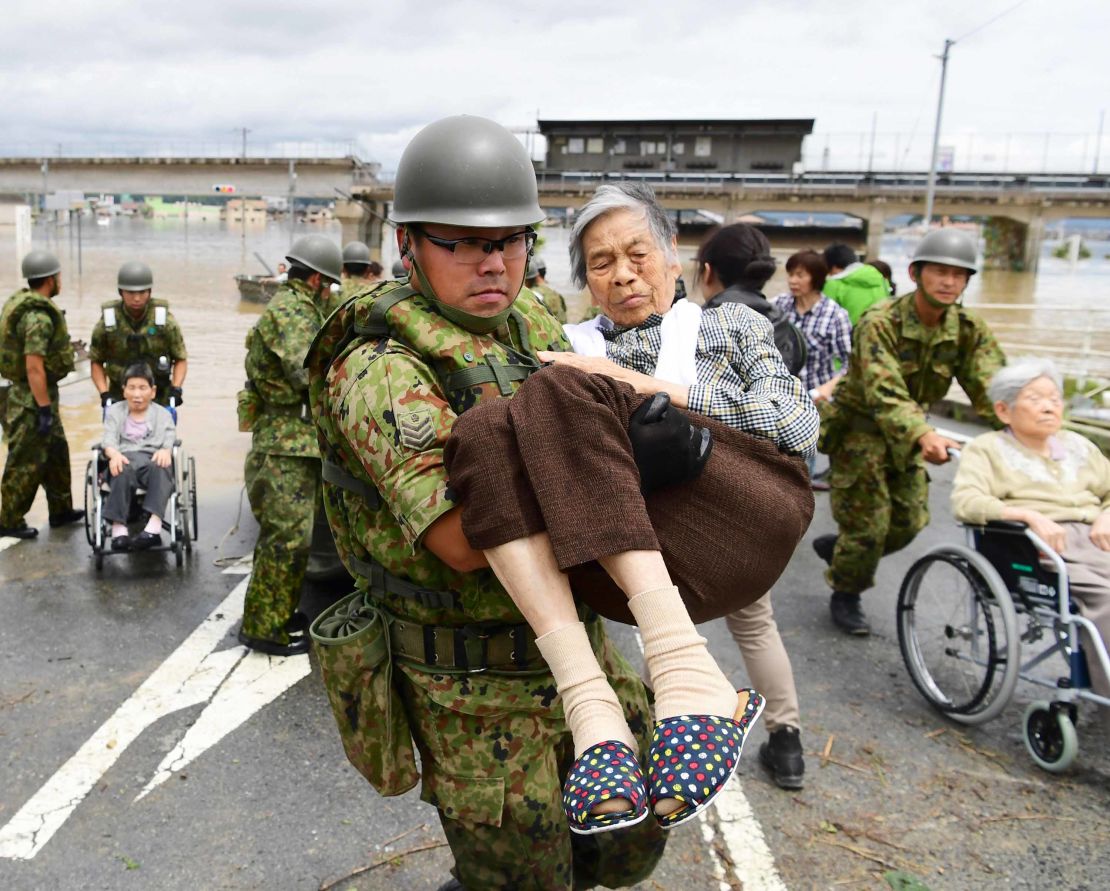 Patients of Mabi Memorial Hospital are rescued by Self-Defense Force members on July 8, 2018 in Kurashiki, Okayama, Japan. 