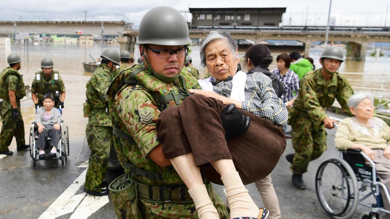 Patients of Mabi Memorial Hospital are rescued by Self-Defense Force members on July 8, 2018 in Kurashiki, Okayama, Japan. 