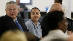 Cyntoia Brown, a woman serving a life sentence for killing a man when she was a 16-year-old prostitute, smiles at family members during her clemency hearing Wednesday, May 23, 2018, at Tennessee Prison for Women in Nashville, Tenn. It is her first bid for freedom before a parole board since the 2004 crime. (Lacy Atkins /The Tennessean via AP, Pool)