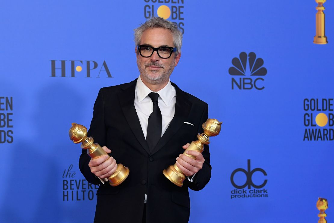 Alfonso Cuarón poses poses in the press room during the 76th Annual Golden Globe Awards 