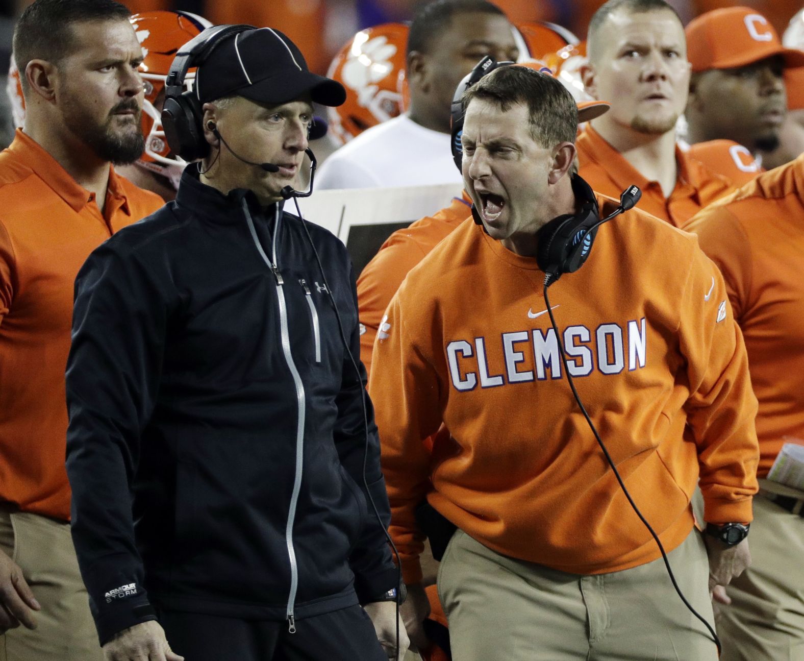 A referee gets an earful from Swinney.