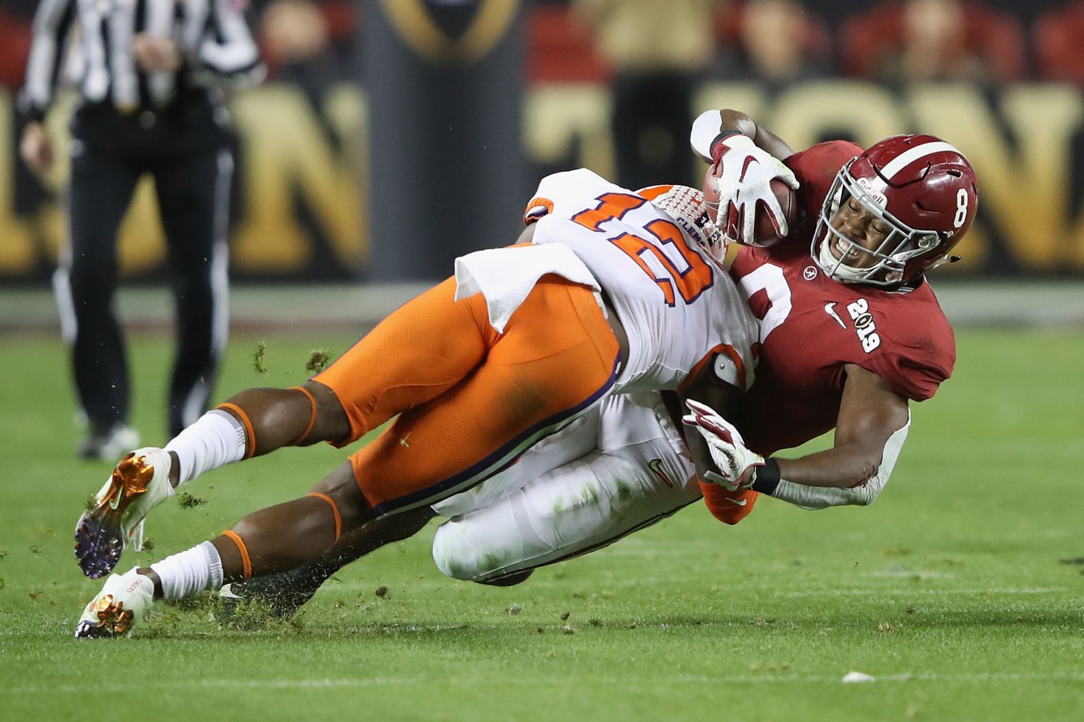 Clemson's K'Von Wallace tackles Alabama running back Josh Jacobs in the first half.