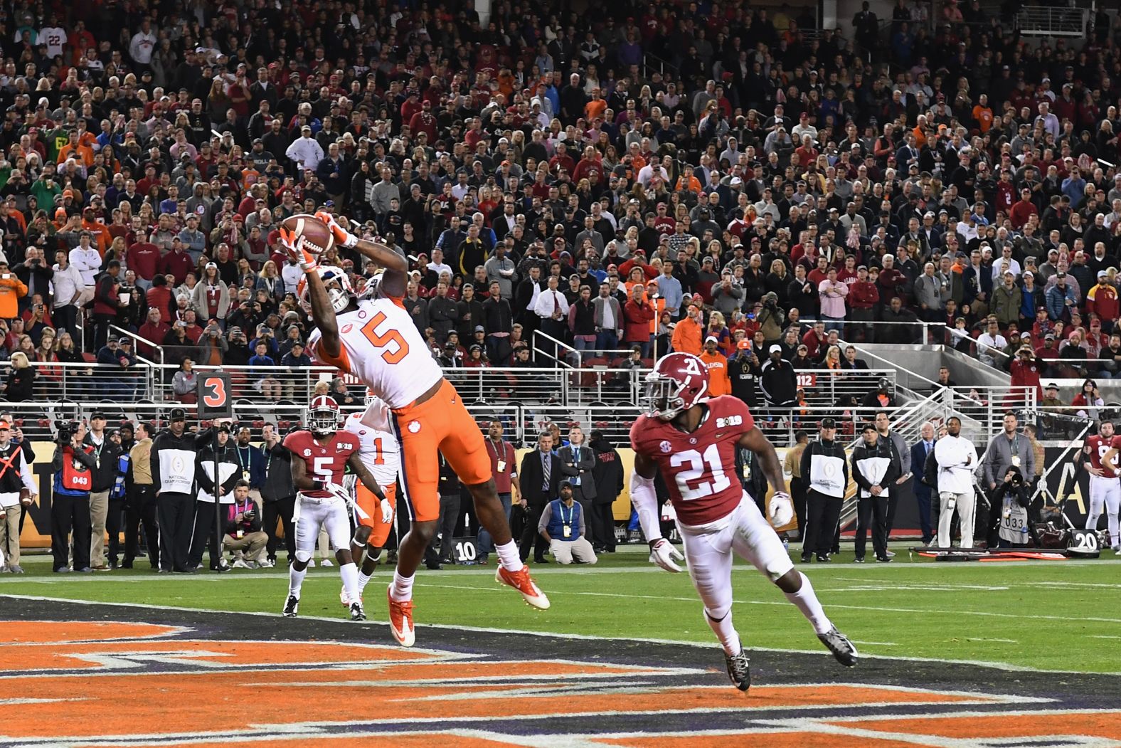 Tee Higgins catches a third-quarter touchdown pass for Clemson. It was the final score of the game.