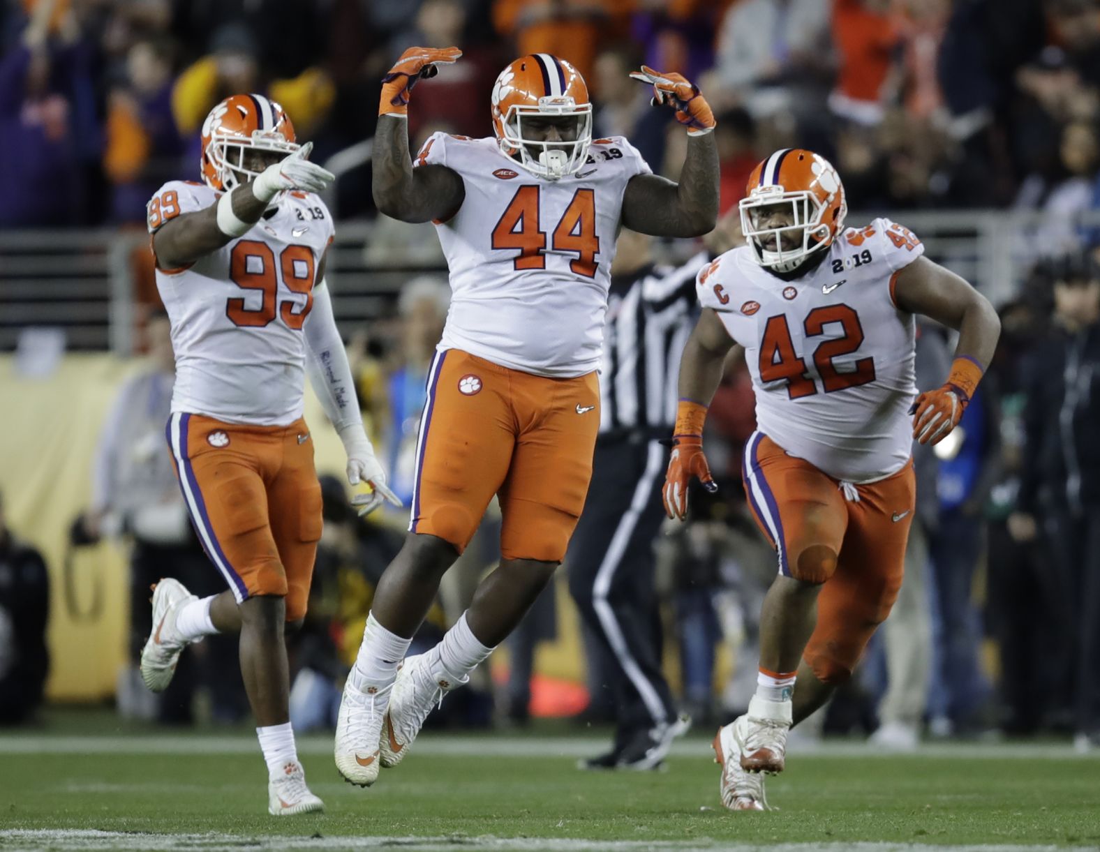 Clemson's Nyles Pinckney, center, celebrates after stopping a fake field goal by Alabama during the second half.