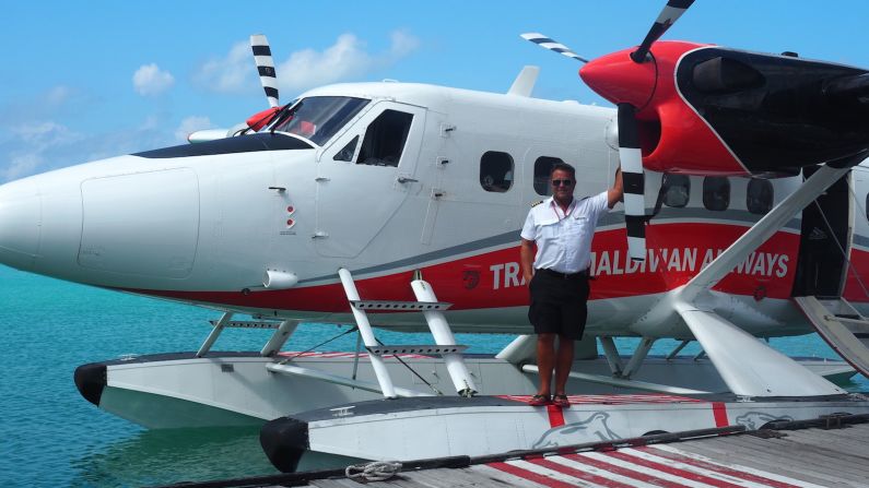 <strong>World's best job?:</strong> Captain Andrew Farr is one of Trans Maldivian Airways' so-called "barefoot" pilots. He's worked with the airline for over 10 years, transporting thousands of travelers to their resorts via float plane. 