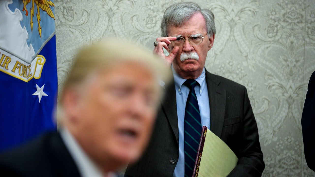 WASHINGTON, DC - SEPTEMBER 28: National security advisor, John Bolton, right, attends a meeting with President Donald Trump and President of Chile, Sebastian Pi?era in the Oval Office of the White House on September 28, 2018 in Washington, DC.
(Photo by Oliver Contreras/For The Washington Post via Getty Images)