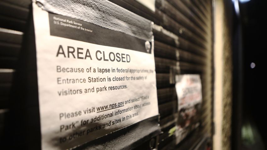 JOSHUA TREE, CA - JANUARY 03:  A 'closed' sign is posted a shuttered entrance station at Joshua Tree National Park on January 3, 2019 in Joshua Tree, California. The gate is normally staffed during the day but is now unstaffed 24 hours per day, allowing free entrance for all visitors. Campgrounds have been closed at the park and other services suspended during the partial government shutdown.  (Photo by Mario Tama/Getty Images)