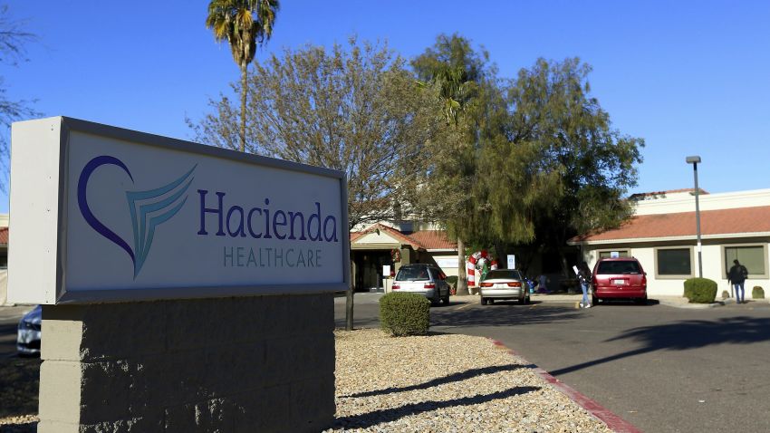 This Friday, Jan. 4, 2019, photo shows Hacienda HealthCare in Phoenix. The revelation that a Phoenix woman in a vegetative state recently gave birth has prompted Hacienda HealthCare CEO Bill Timmons to resign, putting a spotlight on the safety of long-term care settings for patients who are severely disabled or incapacitated. (AP Photo/Ross D. Franklin)