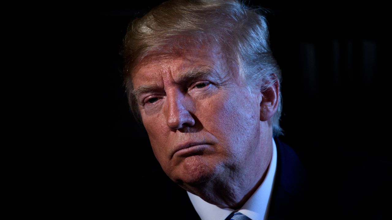 TOPSHOT - US President Donald Trump chairs a meeting with administration and state officials on prison reform at the Trump National Golf Club August 9, 2018 in Bedminster, New Jersey. (Photo by Brendan Smialowski / AFP)